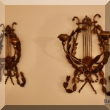 D46. Pair of lyre-shaped metal candle sconces. 